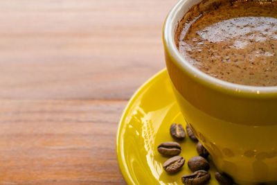 Close-up of coffee cup on table