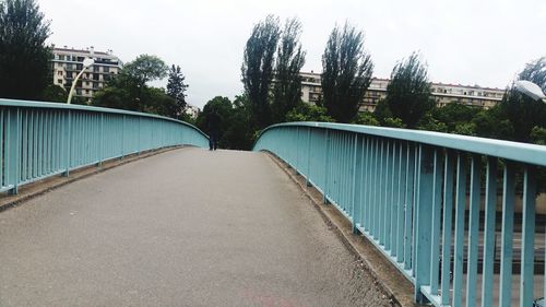 View of bridge against cloudy sky