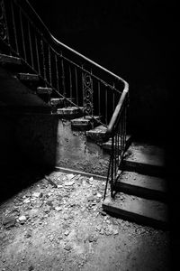 Abandoned staircase against old building