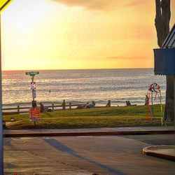 Scenic view of sea at sunset