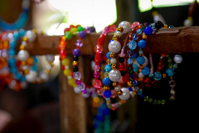 Close-up of multi colored hanging for sale in market