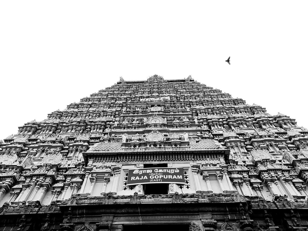 architecture, built structure, building exterior, black and white, sky, travel destinations, low angle view, history, the past, building, travel, clear sky, temple - building, landmark, religion, belief, tourism, monochrome photography, place of worship, monochrome, nature, no people, archaeological site, day, spirituality, outdoors, ancient, city, monument, temple