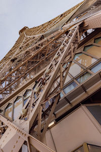 Low angle view of building under construction against sky