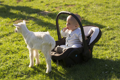 Full length of child on field