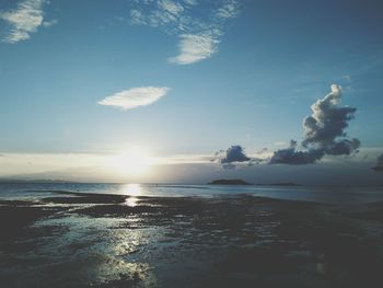 Scenic view of sea against sky at sunset