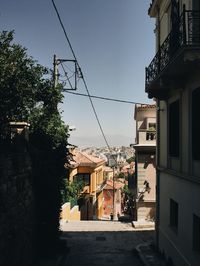 Houses against sky in city