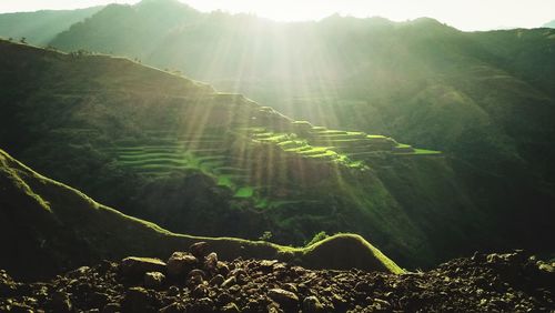 Scenic view of mountains during sunny day