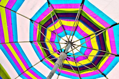 Low angle view of multi colored umbrella