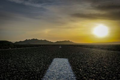 Scenic view of landscape against sky during sunset