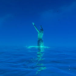 Man diving in sea