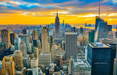 Aerial view of city at sunset