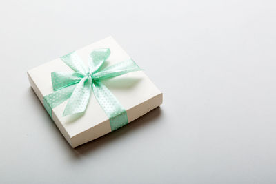 Close-up of gift box on white background