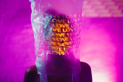 Close-up of hand holding illuminated light painting