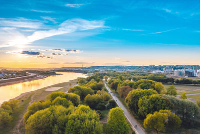 High angle view of plants by river against sky