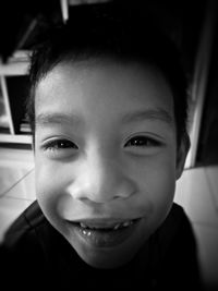 Close-up portrait of smiling boy