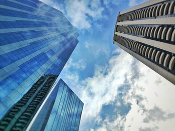 Low angle view of skyscraper against sky