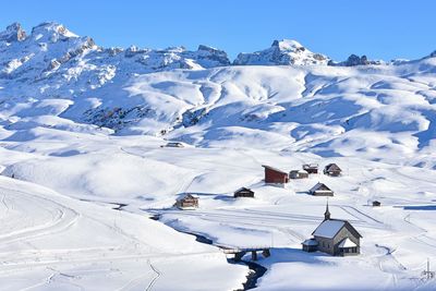Snow covered mountain against sky