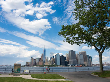 View of city against cloudy sky