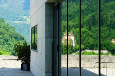 View of building seen through glass window