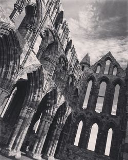 Low angle view of old ruins against sky