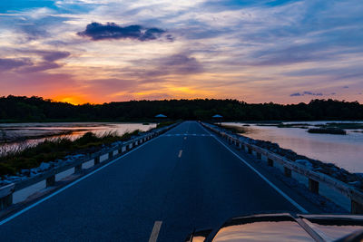 Road against sky during sunset