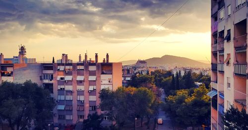 High angle view of buildings in city against sky