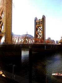 Bridge over river against clear sky