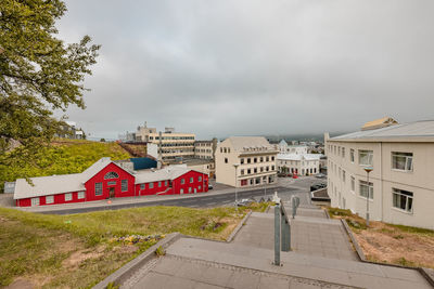 Buildings in city against sky