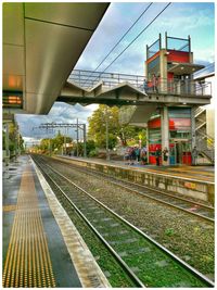 Railroad tracks at railroad station platform