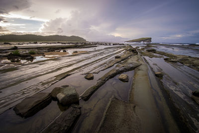 Panoramic view of beach against sky during winter