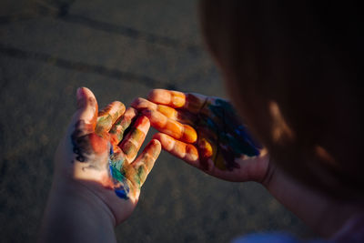 Cropped image of woman holding hands