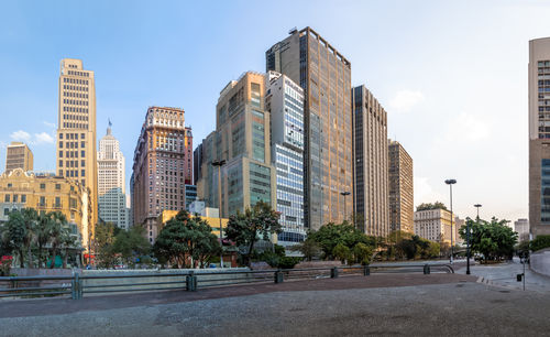 Buildings in city against sky