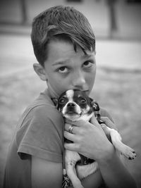 Portrait of boy with dog