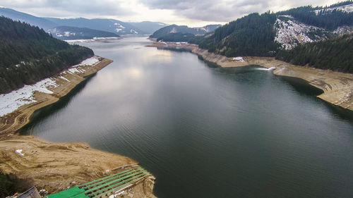 High angle view of river against cloudy sky