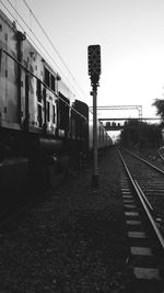 Train on railroad track against sky