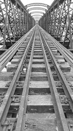 Railway tracks along bridge