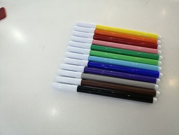 High angle view of colored pencils on table