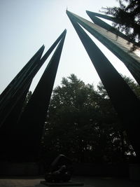 Low angle view of statue against sky