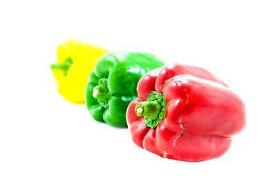 Close-up of red bell pepper against white background