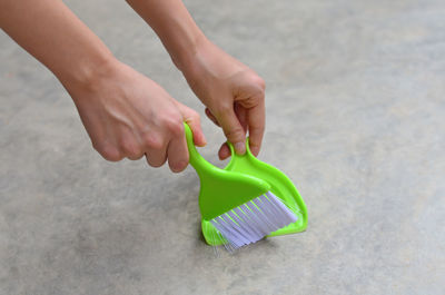 High angle view of woman playing with toy