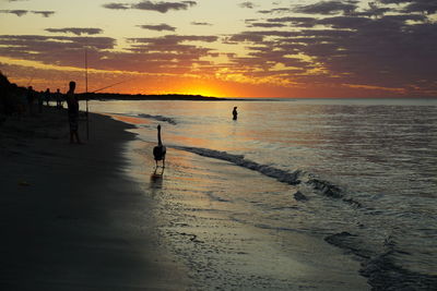 Scenic view of sea against sky at sunset