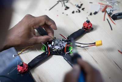 High angle view of man cycling on table