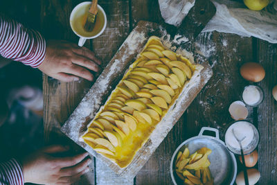 High angle view of man preparing food