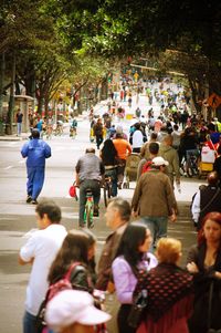 People looking at city street