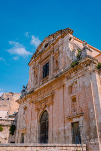 Low angle view of historic building against sky