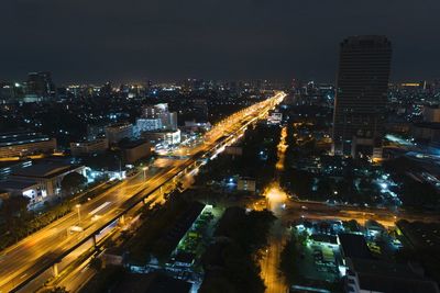 High angle view of illuminated cityscape at night