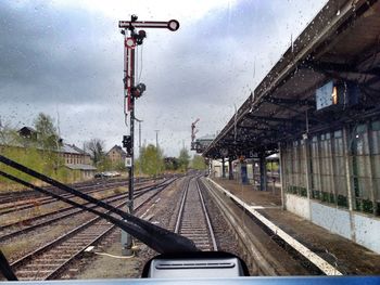 Railroad track seen through train windshield