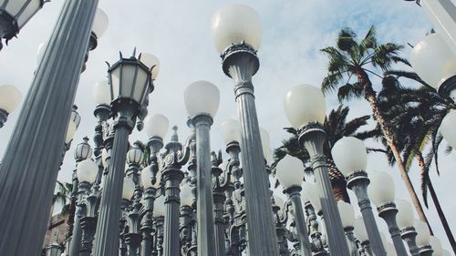 Low angle view of street light against sky