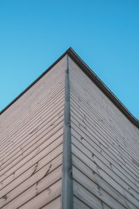 Low angle view of built structure against blue sky