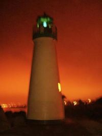 Low angle view of illuminated built structure at night